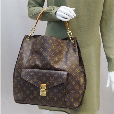 Metis hobo leather handbag Louis Vuitton Navy in Leather